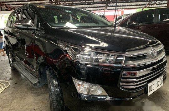 Selling Black Toyota Innova 2016 at 18000 km-1