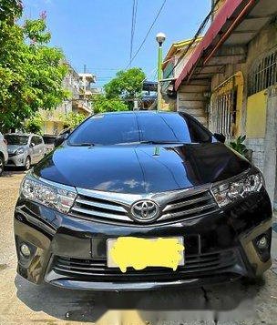 Sell Black 2014 Toyota Corolla Altis at 75000 km