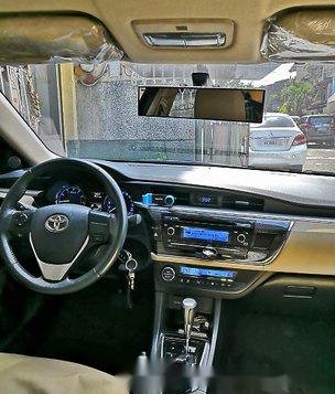 Sell Black 2014 Toyota Corolla Altis at 75000 km-3