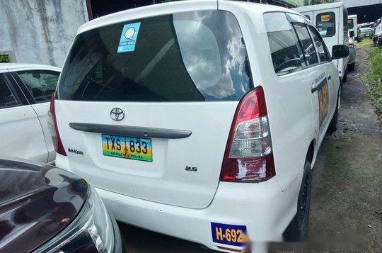 White Toyota Innova 2014 at 228000 km for sale-2