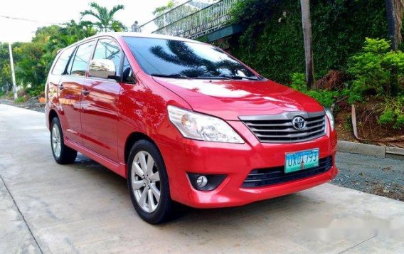 Red Toyota Innova 2013 Manual Diesel for sale