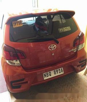 Selling Orange Toyota Wigo 2019 Automatic Gasoline at 7000 km 