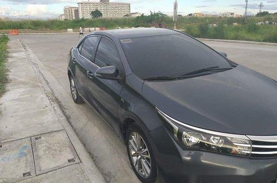 Selling Black Toyota Corolla Altis 2014 -2