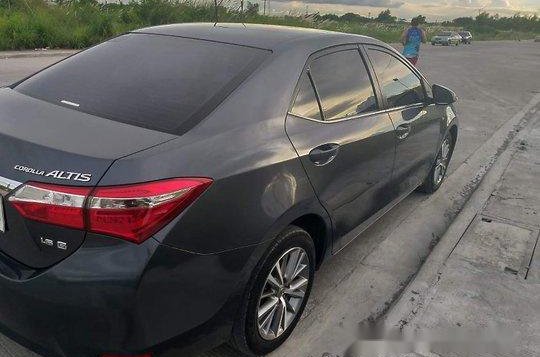 Selling Black Toyota Corolla Altis 2014 -3