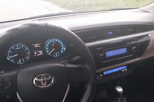 Selling Black Toyota Corolla Altis 2014 -4