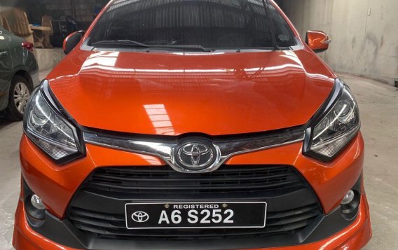 Orange Toyota Wigo 2018 for sale in Quezon City 