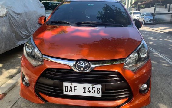 Orange Toyota Wigo 2017 for sale in Quezon City