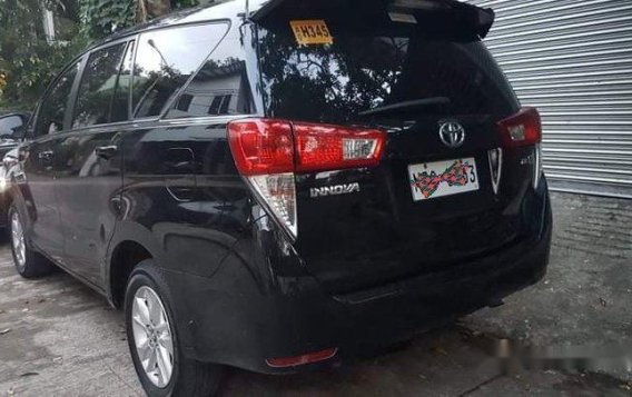 Selling Black Toyota Innova 2017 in Quezon City -2