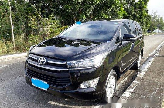 Selling Black Toyota Innova 2017 at 35000 km