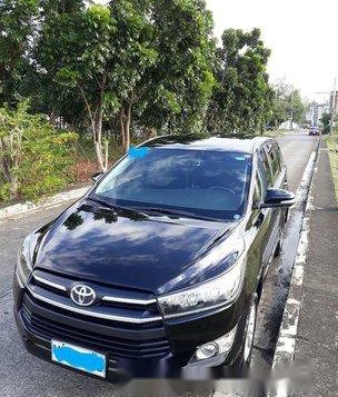 Selling Black Toyota Innova 2017 at 35000 km-1