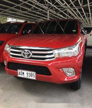Red Toyota Hilux 2016 at 25000 km for sale