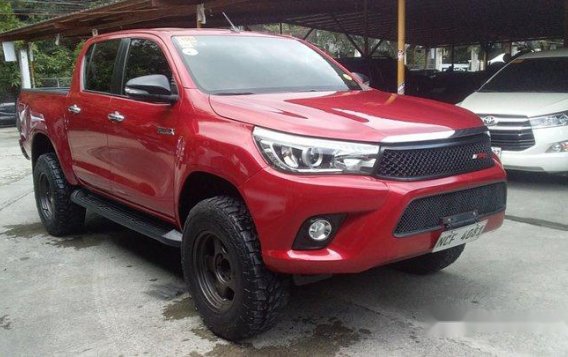 Red Toyota Hilux 2016 at 20000 km for sale