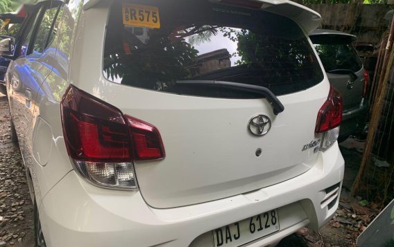 Selling White Toyota Wigo 2019 in Quezon City -3