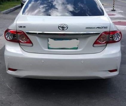 Sell Pearl White 2013 Toyota Corolla altis in Aguinaldo-5