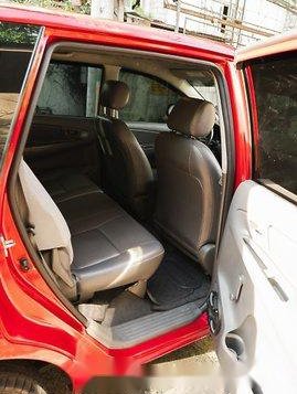 Red Toyota Innova 2013 for sale in Quezon City -7