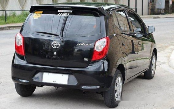 Sell Black 2014 Toyota Wigo Hatchback -3