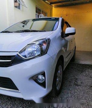 Sell White 2014 Toyota Wigo in San Pablo-1