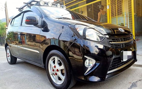 Selling Black Toyota Wigo 2014 in Manila-5