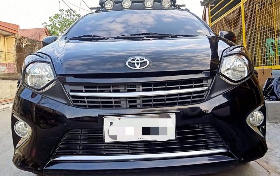 Selling Black Toyota Wigo 2014 in Manila-1
