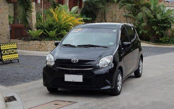 Sell Black 2014 Toyota Wigo Hatchback -1
