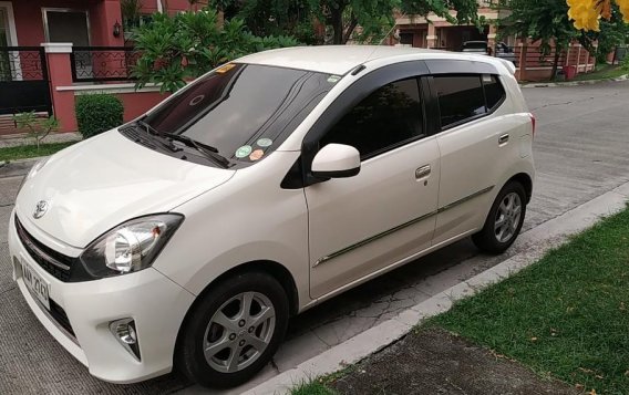 Pearlwhite Toyota Wigo 2014 for sale in Malolos-2