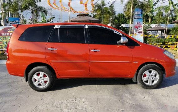 Orange Toyota Innova 2005 for sale in Manila-1