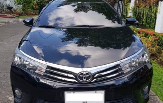 Selling Black Toyota Corolla altis 2015 in Quezon City
