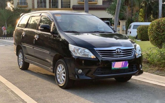 Selling Black Toyota Innova 2014 in Quezon City-4