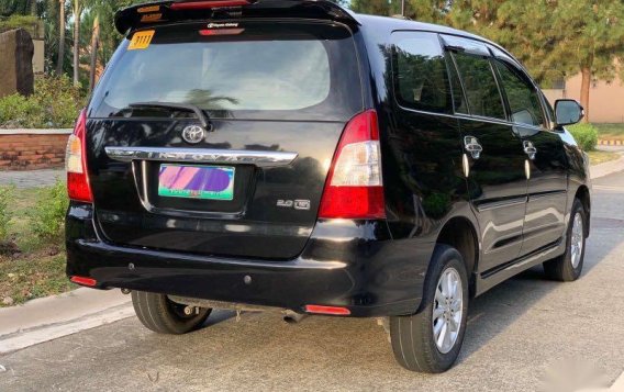 Selling Black Toyota Innova 2014 in Quezon City-1