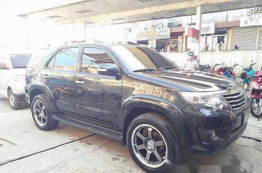 Selling Black Toyota Fortuner 2012 at 74000 km 