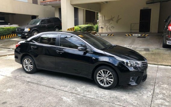 Selling Black Toyota Corolla altis 2014 in Quezon City