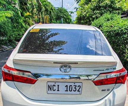 Pearl White Toyota Corolla altis for sale in Manila-7