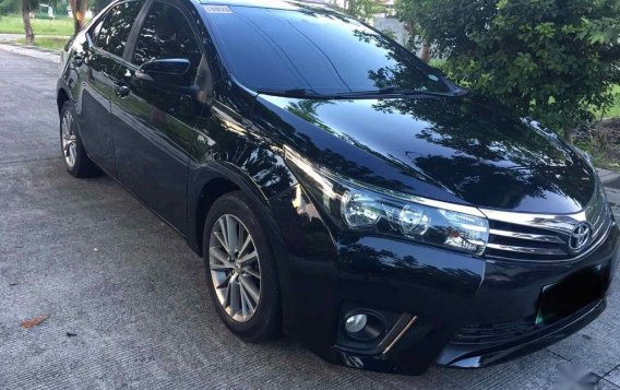 Sell Black 2014 Toyota Corolla in San Fernando-1