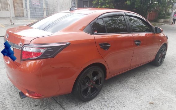 Sell Orange Toyota Vios in Quezon City