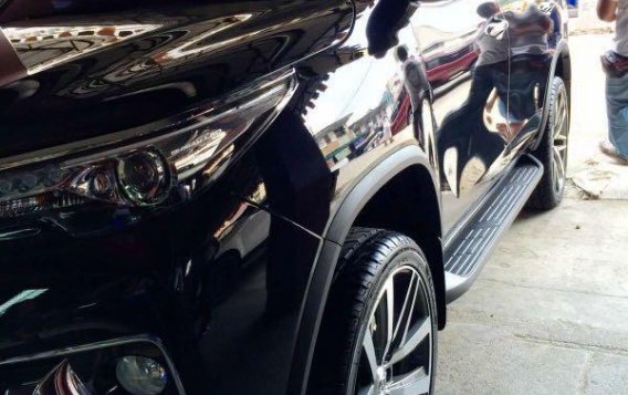 Selling Black Toyota Fortuner in Quezon City