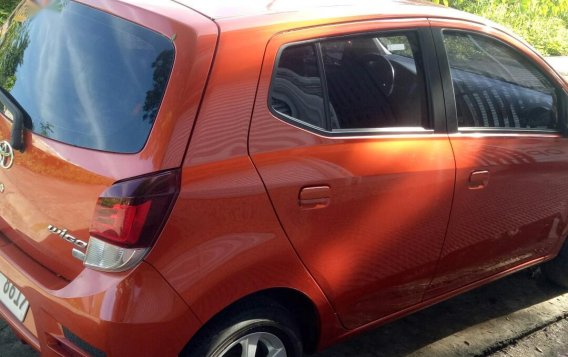 Selling Orange Toyota Wigo in Apalit