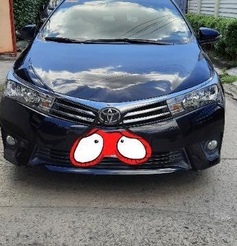 Sell Black 2014 Toyota Corolla in Bauan