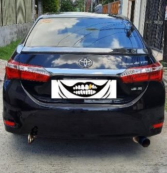 Sell Black 2014 Toyota Corolla in Bauan-1