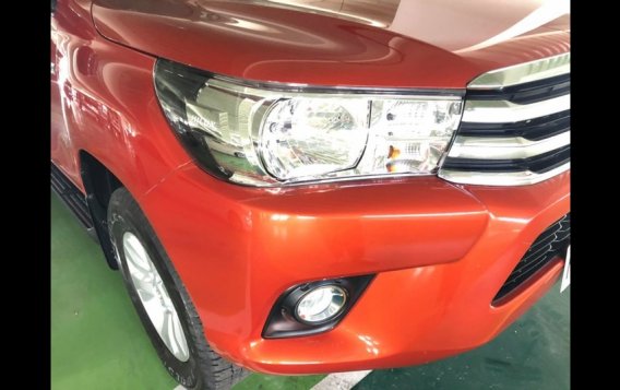 Orange Toyota Hilux 2018 at 27364 km for sale in Manila-4