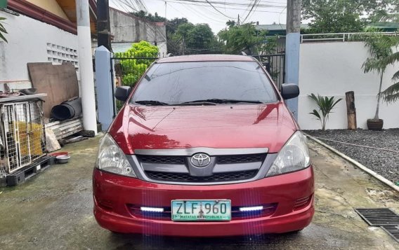 Red Toyota Innova 2007 SUV at 84000 km for sale in Manila