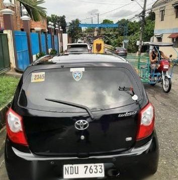 Selling Black Toyota Wigo 2016 in Calamba-2