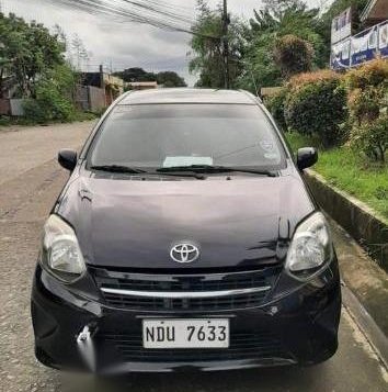 Selling Black Toyota Wigo 2016 in Calamba