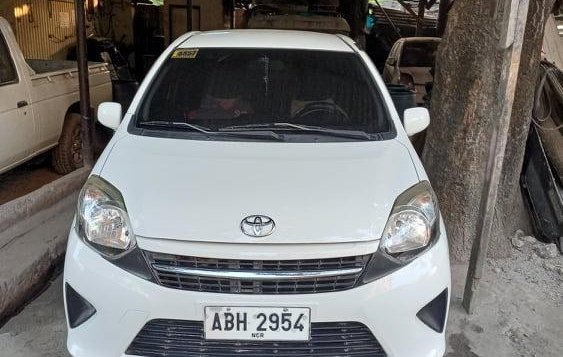 Selling White Toyota Wigo 2015 in Caloocan