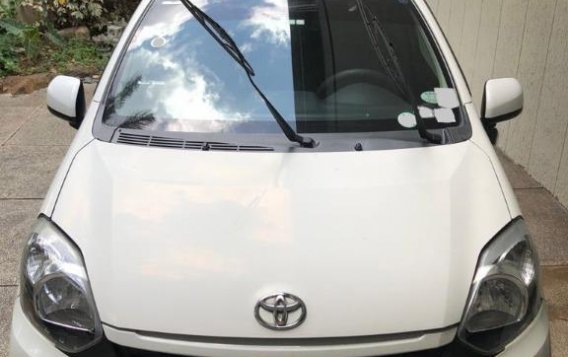 Pearl White Toyota Wigo 2015 for sale in San Mateo