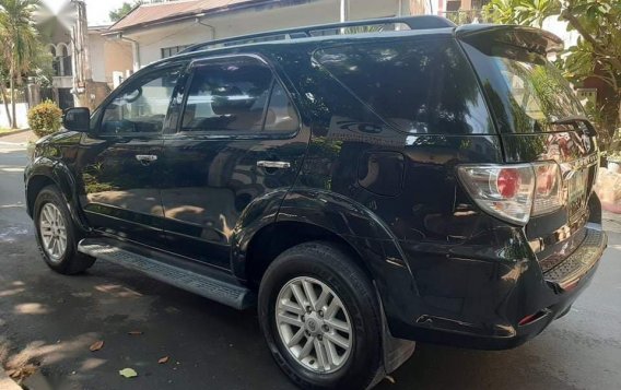 Selling Black Toyota Fortuner 2013 in Quezon-2