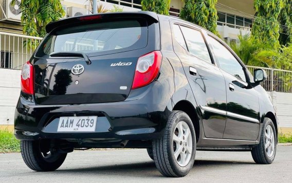 Black Toyota Wigo 2014 for sale in Noveleta