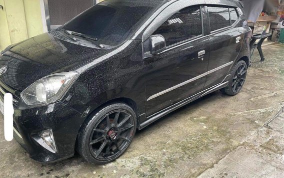 Black Toyota Wigo 2014 for sale in Quezon