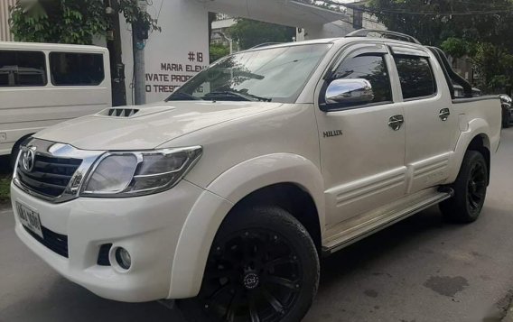Sell White 2015 Toyota Hilux in Quezon City-1