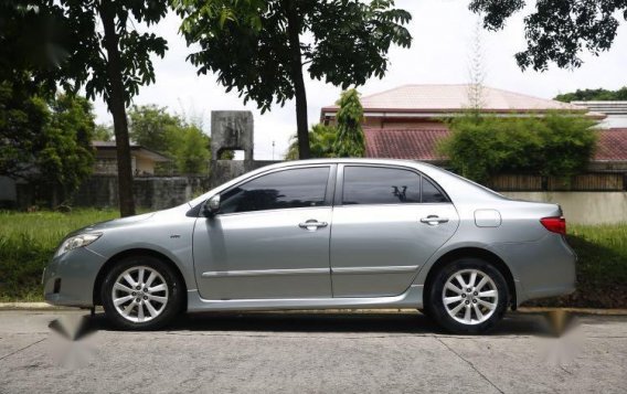 Brightsilver Toyota Corolla Altis 2010 for sale in Quezon-5