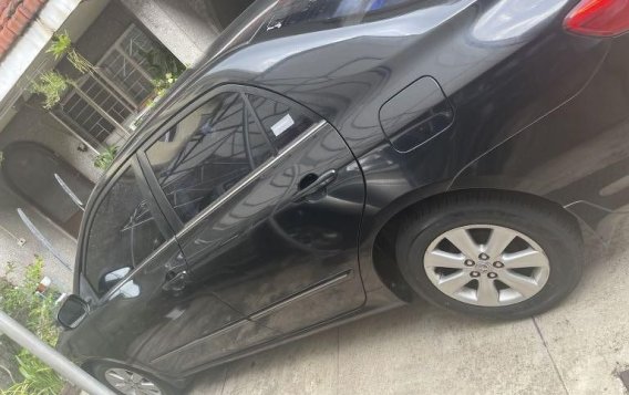 Selling Black Toyota Corolla Altis 2011 in Kalayaan-7